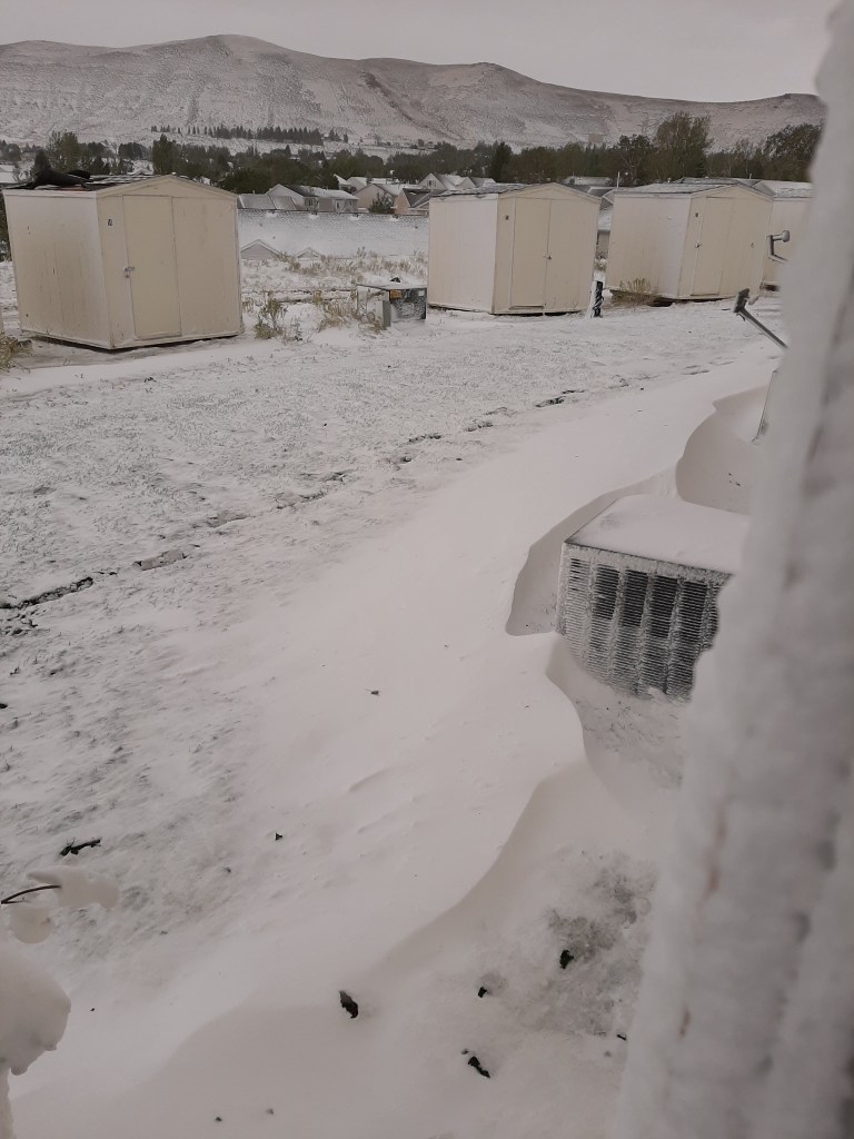 The small snow drifts that piled up behind our house.